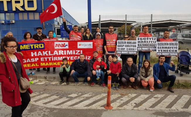 Hakkını alamayan işçiler Metro marketi işgal etti